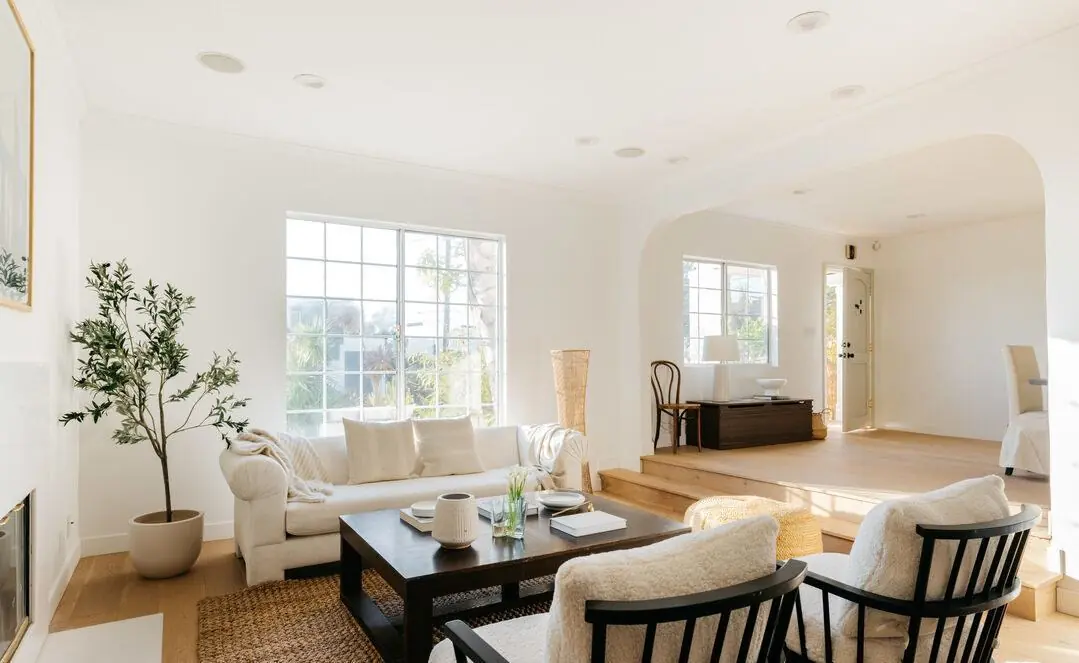 Living room with arched openings after a whole-house renovation